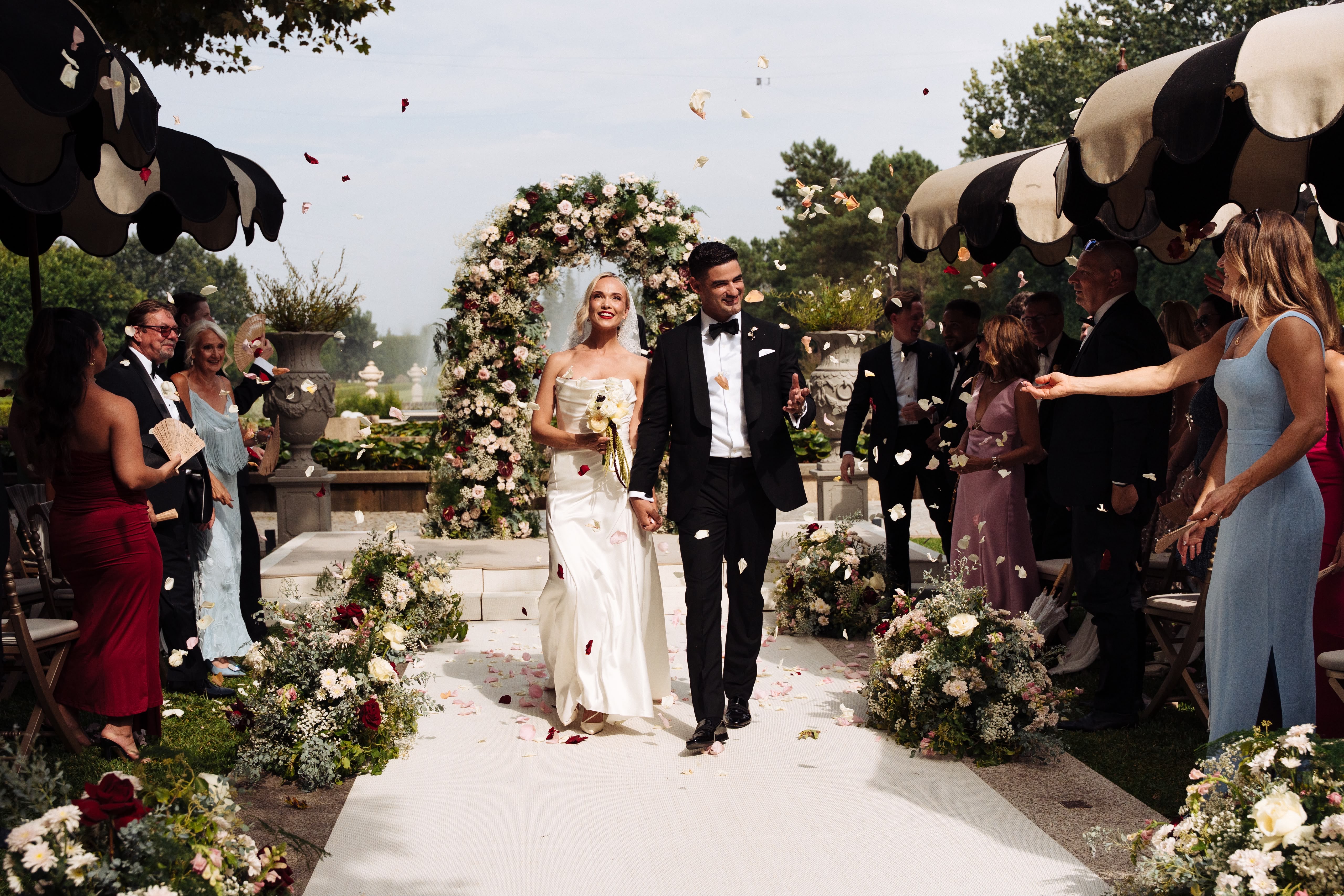 Bride and groom with their wedding party